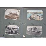 A good postcard album containing mostly Devon and Cornwall examples, postcards of abbeys ,