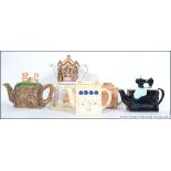 A collection of novelty teapots to include examples from Regency Fine Arts & Sadler etc.