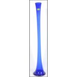 A very tall 20th century studio Bristol blue style glass vase. Bearing makers sticker to the front.