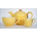 A 1930's Art Deco Brentleigh Ware teapot together with a matching creamer and sugar bowl.