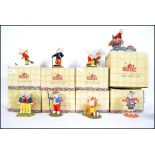 A collection of nine boxed Royal Doulton ceramic figures from the ' Rupert Collection ' to include