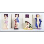 A collection of Royal Doulton ceramic figures from the Archives collection to include ' Lido Lady '