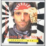 A Signed Nils Lofgren 12" single ( record ) - The secret in the streets