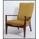 A vintage mid century Parker Knoll armchair model no PK988 The chair with squared legs and shaped