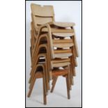 A set of 6 mid century stacking school - village hall chairs on panel wood construction being