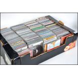 A large box of cd's and cd singles to include many various genres.