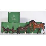 A group of five Royal Doulton ceramic figures to include Shetland Pony Brown,