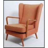 A vintage mid century Parker Knoll style armchair.