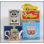 A group of collectable novelty teapots to include East Enders Queen Vic,