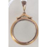 A 19th century Victorian hallmarked ( rubbed ) 9ct gold locket having double sided glass.