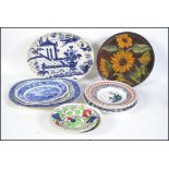 A collection of 19th century and 20th century Bristol pottery plates.