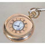 A early 20th century gold plated half hunter pocket watch by Denison,