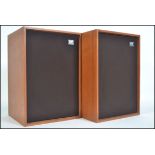 A pair of retro Whafdale Denton 2XP teak cased bookshelf speakers with applied Wharfdale labels to