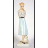 A Royal Doulton ceramic 1950's Lady Teenagers Figure ' Sweet Sixteen ' HN 2231 by Peggy Davies.