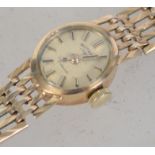 A 9ct gold / 375 marked ladies Rotary cocktail dress watch and bracelet.