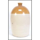 A large tall vintage 20th century advertising stoneware flagon for Hurndall and Co.