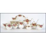 Royal Albert ' Old Country Roses ' tea service to include : Teapot; tray with creamer; sugar bowl;