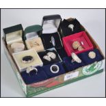 A collection of eleven costume jewellery and silver dress rings to include mother of pearl,