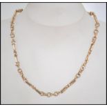 A hallmarked 9ct gold twist chain link necklace with fob clasp. Weight 36.5g. Measures 16 inches.