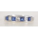 14ct white gold diamond & sapphire ladies ring being channel set. Total weight 3.