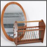 A vintage / retro teak wood oval frameless mirror together with a stunning magazine rack please see