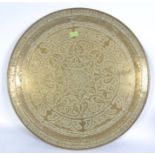 A large brass Islamic table top brass tr