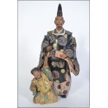 A 19th century Japanese terracotta figur