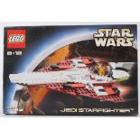 STAR WARS: An original Lego Star Wars Jedi Starfighter 7143 set.