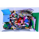 LOOSE LEGO: A large crate of assorted loose Lego to include wheels, some ' Friends ,' minifigures,