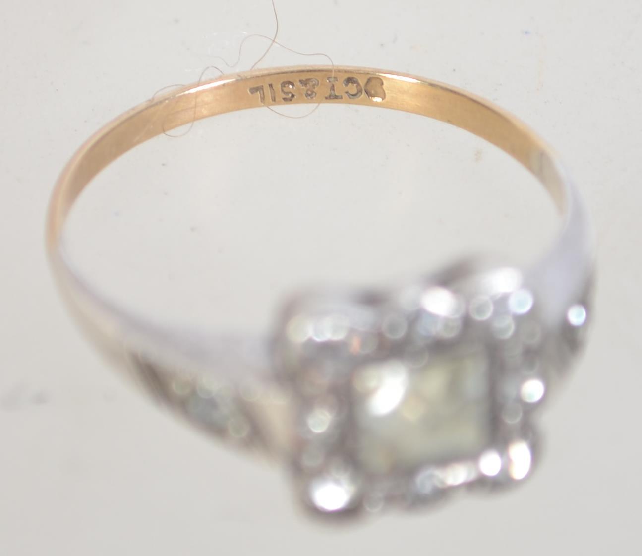 An Art Deco 9ct gold and silver ring with paste stones. Marked 9ct and Sil. Tests 9ct and silver. - Image 3 of 3