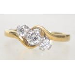 An 18ct gold and Platinum diamond trilogy ring set with three good diamonds a total of approx 60pts.