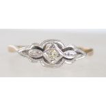 An Art Deco 9ct gold and platinum diamond ring.