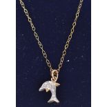 A 9ct gold pendant necklace strung with a diamond set dolphin pendant the chain having a spring