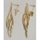 A pair of 9ct gold drop earrings with post backs. Test 9ct gold. Measure 4cms.