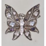 A vintage 925 silver filigree and enamel butterfly brooch with roller clip clasp. Marked 925 S.