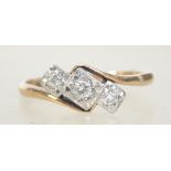 A vintage 9ct gold and platinum diamond 3 stone ring,