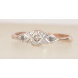 An Art Deco 9ct gold and platinum ring with central rose cut diamond. Size M.