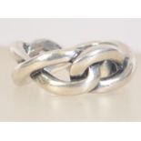 A silver 925 ladies dress ring of Celtic knot design. Ring size M.5 weighs 10.5 grams.