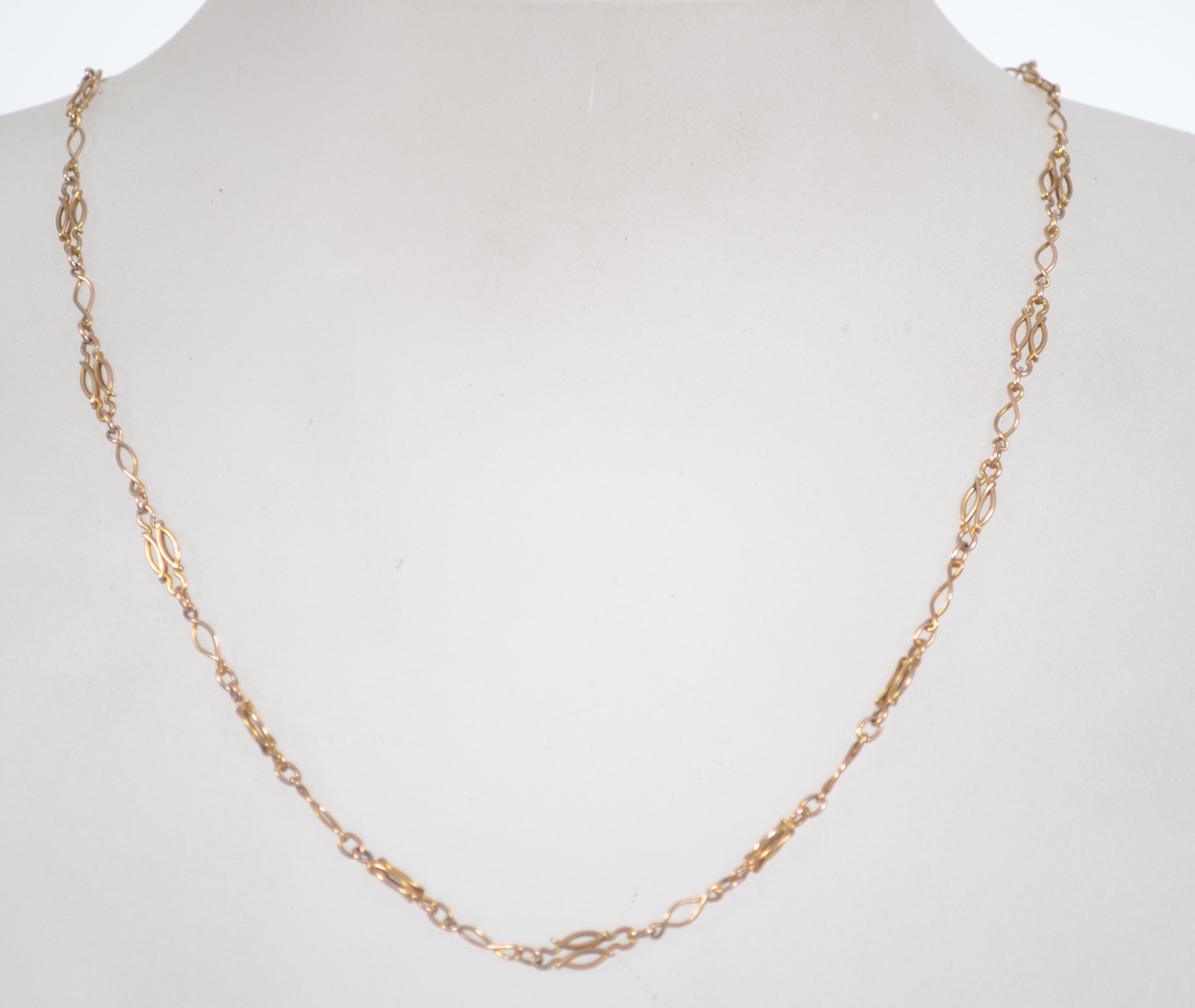 A vintage ladies 9ct gold fancy link necklace with barrel clip clasp. Length 42cms / weight 4.2g.