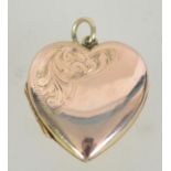 A 9ct gold heart shaped pendant locket marked 9ct back and front. Measures approx 3cms.