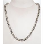 A 925 silver designer byzantine chain necklace. Marked 925. Weight 100g. Measures 16 inches.