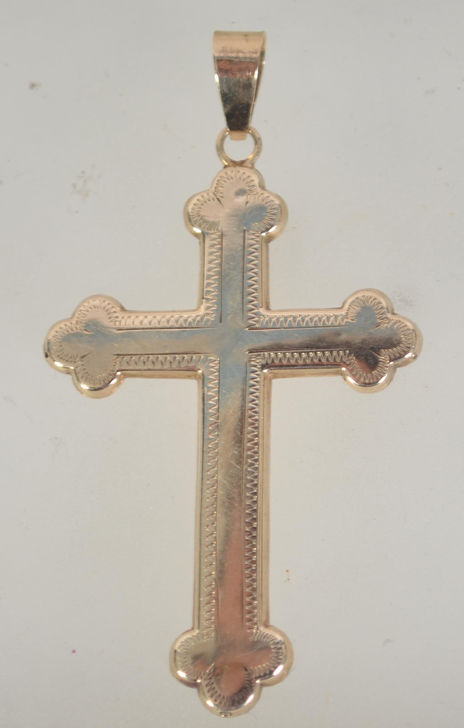 A Victorian 14ct gold crucifix with engraved decoration and central mounted pearl. - Image 2 of 2