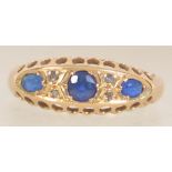 A hallmarked 18ct gold Edwardian blue stone and diamond ring. Hallmarked Birmingham. Size N.