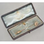 An 18ct gold Victorian stud and pin brooch set with diamonds and pearls in a crescent moon form.