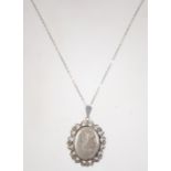 A hallmarked 925 silver locket pendant necklace. Measures chain 18 inches, Locket approx 1.