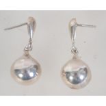 A pair of 925 silver drop earrings with post backs. Measures 1.5 inches.