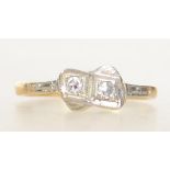 An 18ct gold, platinum and diamond vintage ladies ring. The stones approx 10pnts. Size K.