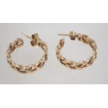 A hallmarked pair of ladies 9ct gold hoop earrings of rope twist form with post backs.