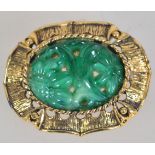 A vintage gold tone peking glass brooch with roller clip clasp. Measures 4.5cms.