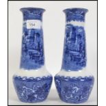 A pair of blue and white baluster vases